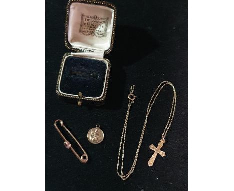 Three pieces of 9ct gold including bar brooch, cross and chain and St. Christopher pendant, 4.30g 