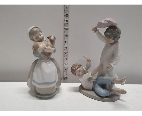 Two Nao figurines 
