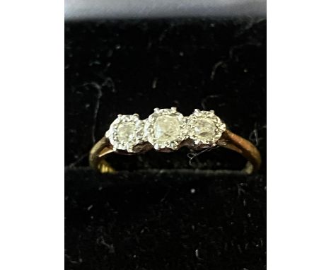A 18ct gold and three stone diamond ring total weight 2.48g 