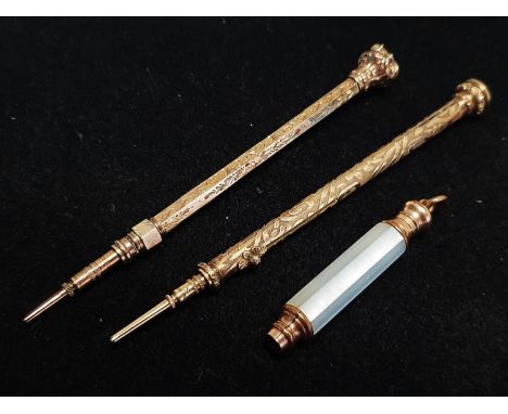 Two gold tone propelling pencils stamped M (Sampson and Mordan?) and one other