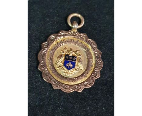 A hallmarked 9ct gold medal dated 1923 total weight 8.38g 