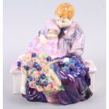 A Royal Doulton bone china figure group, "The Flower Seller's Children" HN806, 7 3/4" high (hair