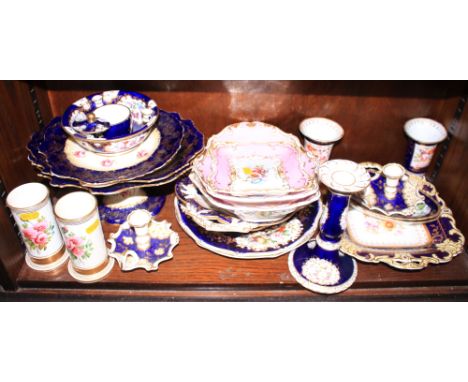 An English part dessert service, decorated flowers on a blue ground, two Spode plates, two spill vases and other itemsConditi