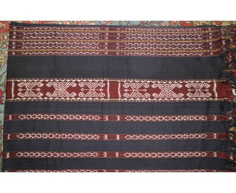 An Ikat panel with stripes and geometric design from Savu, Indonesia, 90" x 60"
