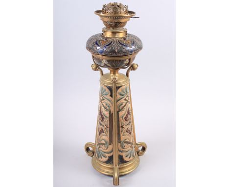 A Doulton Lambeth stoneware oil lamp, decorated by Edith D Lupton, with brass mounts by Hinks, 20" high overallCondition:No a