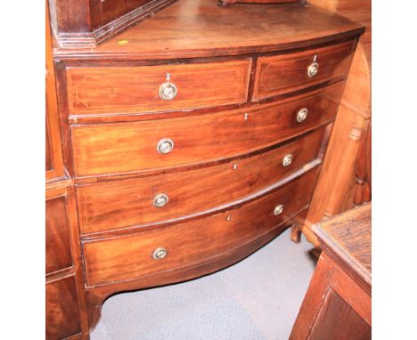A 19th century mahogany and boxwood banded bowfront chest of two short and three long graduated drawers with string inlay, on