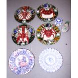 Four Palissy style pottery dishes, decorated crustaceans, a Delft charger, a similar inkwell, a