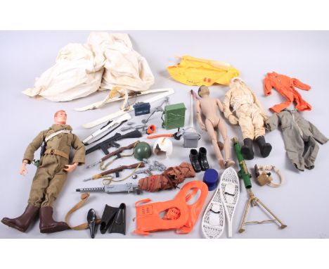 Three Action Man figures and a selection of Action Man accessories