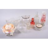 A silver collared cut glass biscuit barrel, a cut glass tea caddy, a mixing bowl and other items