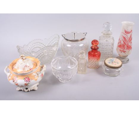 A silver collared cut glass biscuit barrel, a cut glass tea caddy, a mixing bowl and other items of cut glass, etc