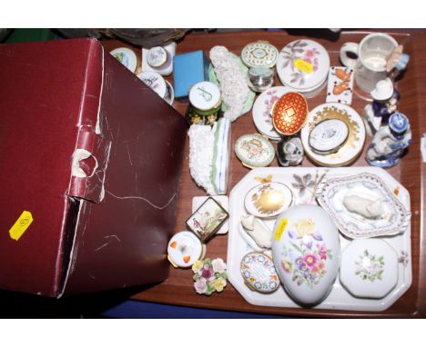A quantity of Halcyon Days pill boxes, two patch boxes, four model sheep, two figures, a Villeroy &amp; Boch tea light, forme