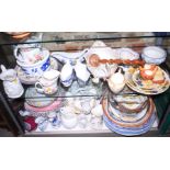Three "Willow" pattern platters and a quantity of jugs, stands, bowls and other items