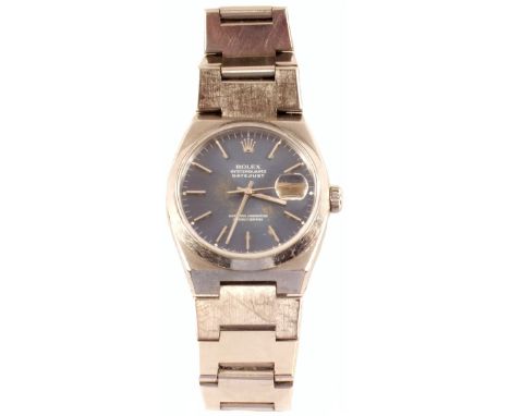 A gents Rolex stainless steel Oyster Quartz DateJust Superlative Chronometer with blue dial, bracelet S/No.17000B, case no.E9