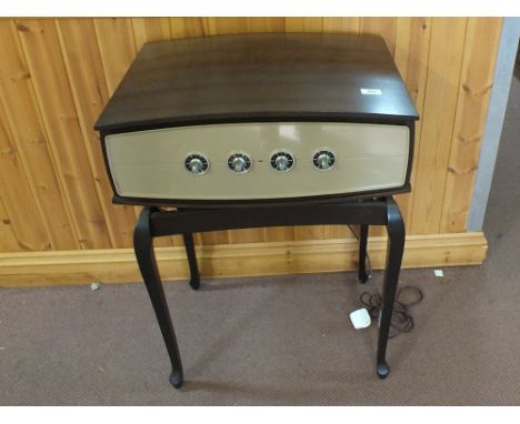 A 1960's Pye Stereophonic Projection System record player with Garrand stylus precision gauge on mahogany stand