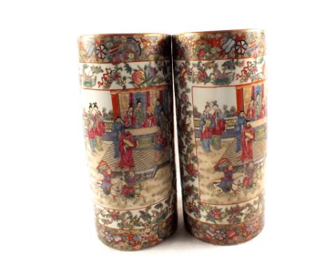 A pair of modern Chinese figure and floral stick stands