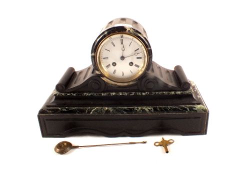 A black and variegated marble mantel clock