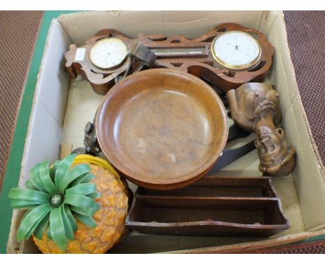 An oak clock, barometer (as found) plus wooden sundries including letter rack, plate stands, Malaysian carvings etc