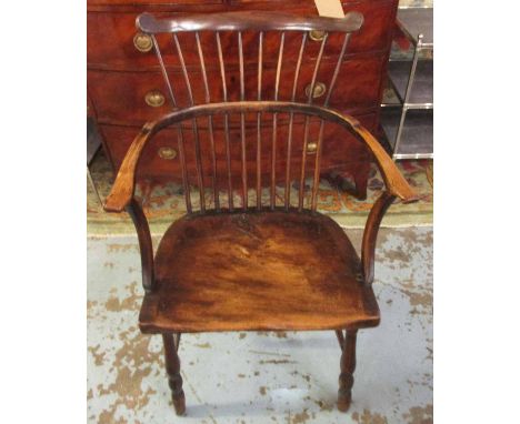 WINDSOR ARMCHAIR, 19th century English ash and elm with a comb back and a dished panelled seat on turned supports joined by s