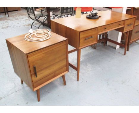 DESK, 1960's with three drawers on turned supports, 132cm x 61cm x 77cm H, plus 1960's side cupboard with internal shelf on t