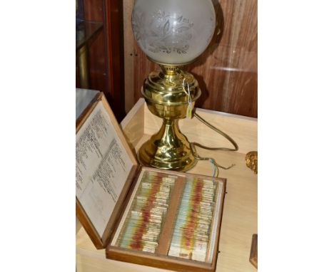 A BOX OF APPROXIMATELY NINETY MICROSCOPE SLIDES, all appear to have been prepared by the same person, list of contents to the