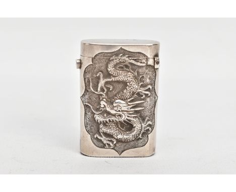 A CHINESE SILVER VESTA, to one side embossed with a dragon, to the other side embossed floral decoration, striker to the base