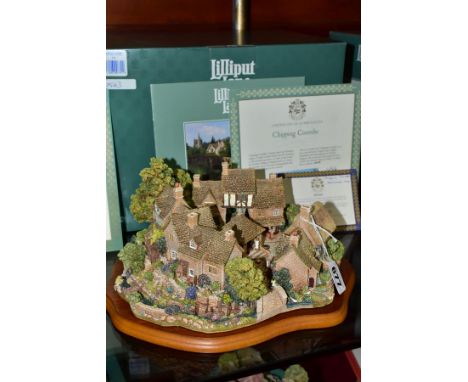 A BOXED LIMITED EDITION LILLIPUT LANE SCULPTURE, Chipping Coombe 779 No 1543/3000, with deeds, certificate, leaflet and woode