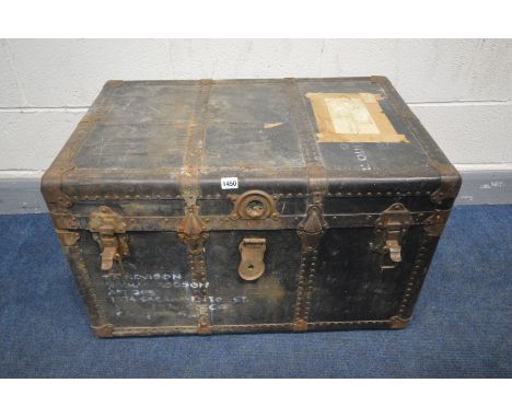 A BLACK DISTRESSED VINTAGE METAL BANDED TRAVELLING TRUNK, width 83cm x depth 55cm x height 50cm