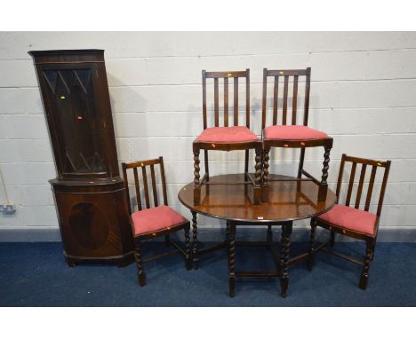 AN OAK BARLEY TWIST GATE LEG TABLE, open width 120cm x closed width 56cm x depth 92cm x height 72cm, with a set of four oak c