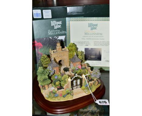 A BOXED LIMITED EDITION LILLIPUT LANE SCULPTURE CELEBRATING THE MILLENNIUM, 'The Millennium Gate' L2170 No 0886/2000, with ce