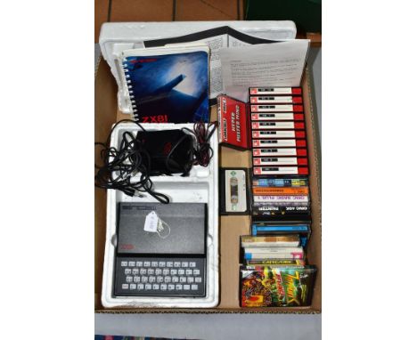 A BOX OF 1980'S COMPUTER GAMES AND A SINCLAIR ZX81, to include Oric, Oric1 and Oric 48K games (full list available on request