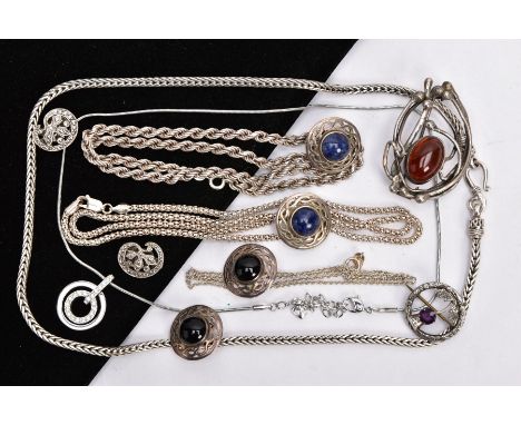 A SELECTION OF WHITE METAL JEWELLERY, to include four white metal chains, some with marks to indicate silver, a white metal C