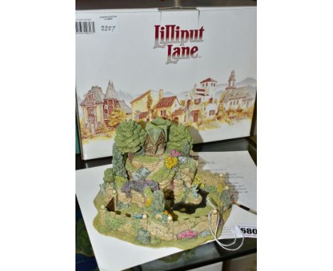 A BOXED LIMITED EDITION LILLIPUT LANE SCULPTURE, Leonora's Secret No. 2257/2500 with certificate and leaflet (Condition:- goo