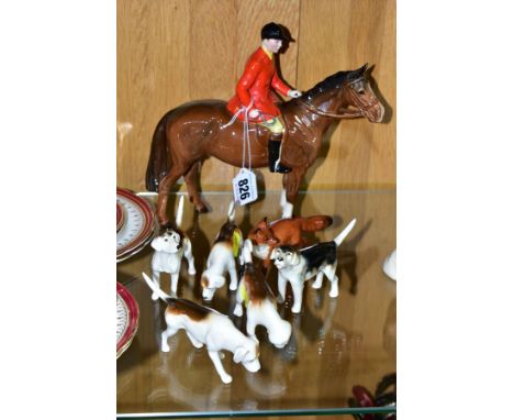 A BESWICK HUNTSMAN, FOX AND FIVE FOXHOUNDS, the Huntsman, style two standing, brown gloss model no. 1501, chipped ear to hors