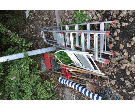 TWO ALIMINIUM STEP LADDERS, another set of steps, parasol in bag, parasol base and a quantity of garden tools