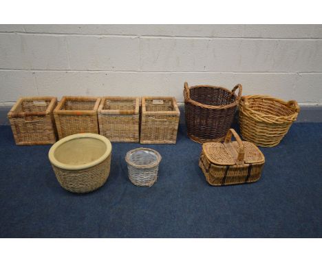 EIGHT VARIOUS BASKETS and a ceramic bowl inside a fitted basket (9)