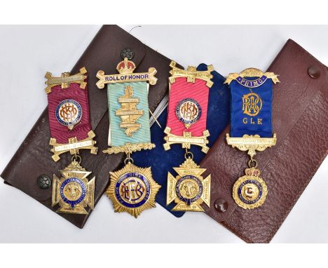 FOUR SILVER MASONIC FOB MEDALS, four gilt and enamelled fob medals, each fitted with their ribbons and pins, each with a full