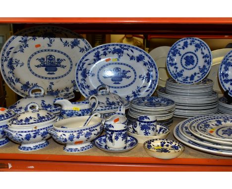 A LATE 19TH CENTURY/EARLY 20TH CENTURY BLUE AND WHITE DINNER SERVICE IN THE DELFT PATTERN BY MINTON AND OTHER MANUFACTURERS i