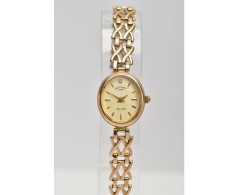 A 9CT GOLD ROTARY WRISTWATCH WITH BOX, the oval face with baton hour markers, the strap designed as crossover style links, 9c