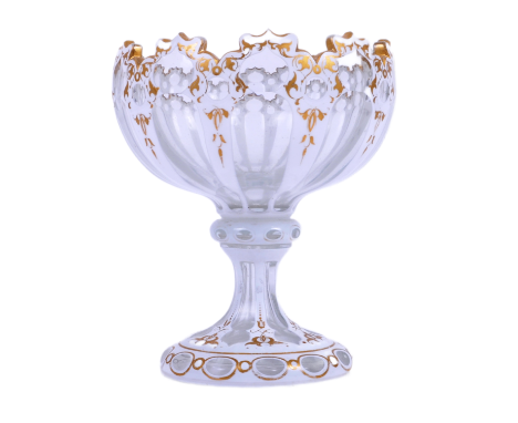 A Victorian 19th century Bohemian cut glass chalice goblet. The vase having a shaped cut rim over a segmented body with white