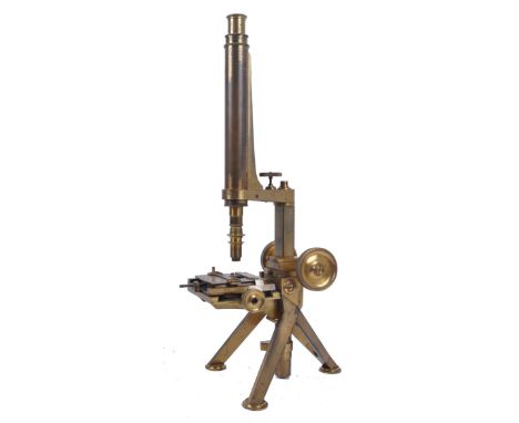 A mid nineteenth century Victorian brass mounted monocular microscope with built-in tripod base. Marked to verso Thos. D. Kin