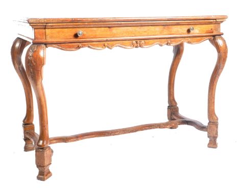 A George II 18th century walnut side hall console table. The table having a straight, chamfered edge over a fitted frieze. Ra