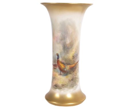 A Royal Worcester hand painted porcelain cabinet vase by James Stinton model 923. The vase from the game bird series having a