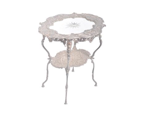 A late 19th Century Continental silver plated side occasional table / wine or lamp table. Inset glass mirror panel to top wit