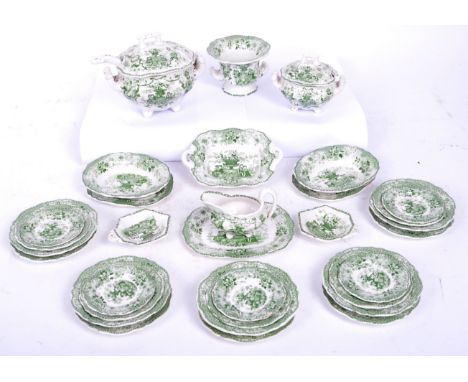 A Victorian 19th century English Staffordshire ceramic miniature doll house children dinner service. The set having green tra