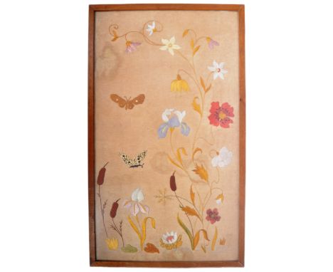 An early 20th Century tapestry embroidery panel depicting butterflied and blossoming flowers on beige ground. Framed &amp; gl