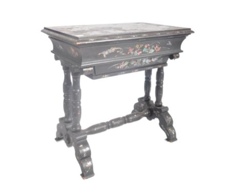 A 20th century Japanese abalone shell inlaid chinoiserie lacquered ladies work table. Raised on block and turned legs united&