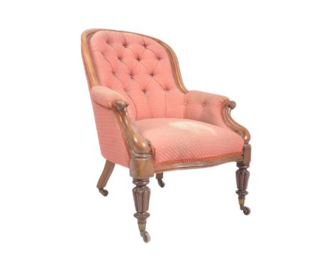 A 19th century Victorian mahogany framed spoon back&nbsp;salon chair / armchair having pink button back upholstery with padde