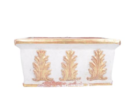 A mid-20th century Classical style terracotta planter / flower pot, painted white and gold. Rectangular with moulded corners,