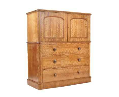 A Victorian 19th century satinwood tallboy chest of drawers / linen press.&nbsp; Raised on a plinth base with a double door l