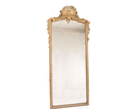 A large 19th Century giltwood and gesso worked tall wall mirror. Gilt wood and gesso worked frame with carved acanthus leaf a